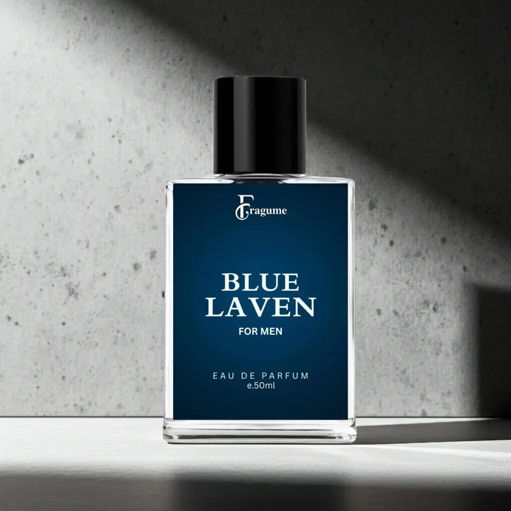 Fragume Blue Laven Eau De Parfum for men in a sleek 50ml glass bottle with a deep blue label on a concrete surface.