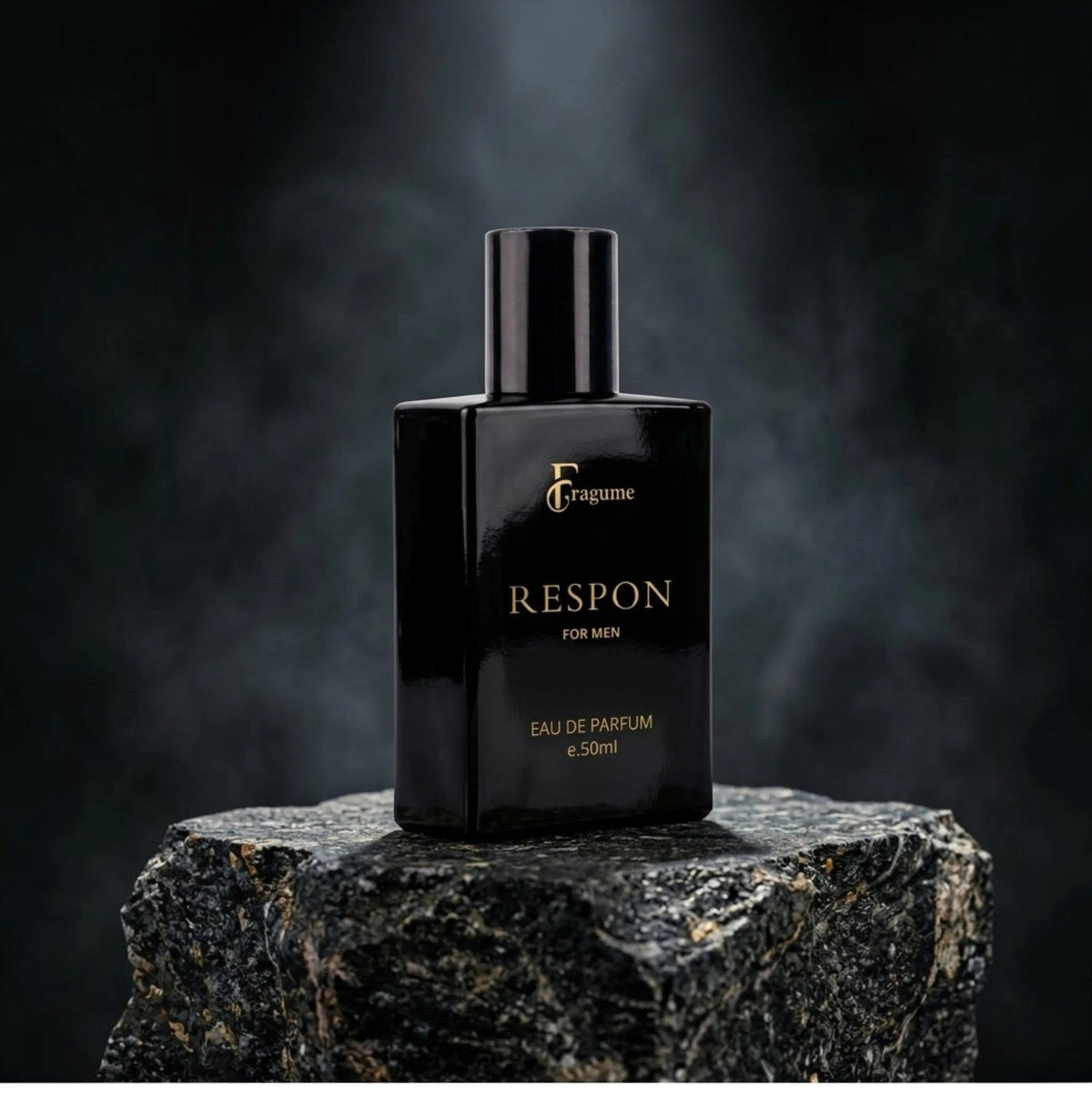 fragume Respon Eau De Parfum for men in a sleek black glass bottle with gold lettering displayed on a dark stone