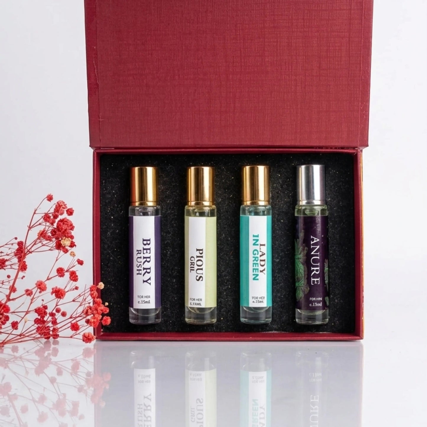 fragume 4 pocket perfume set featuring four travel-sized roll-on fragrance bottles in a red gift box