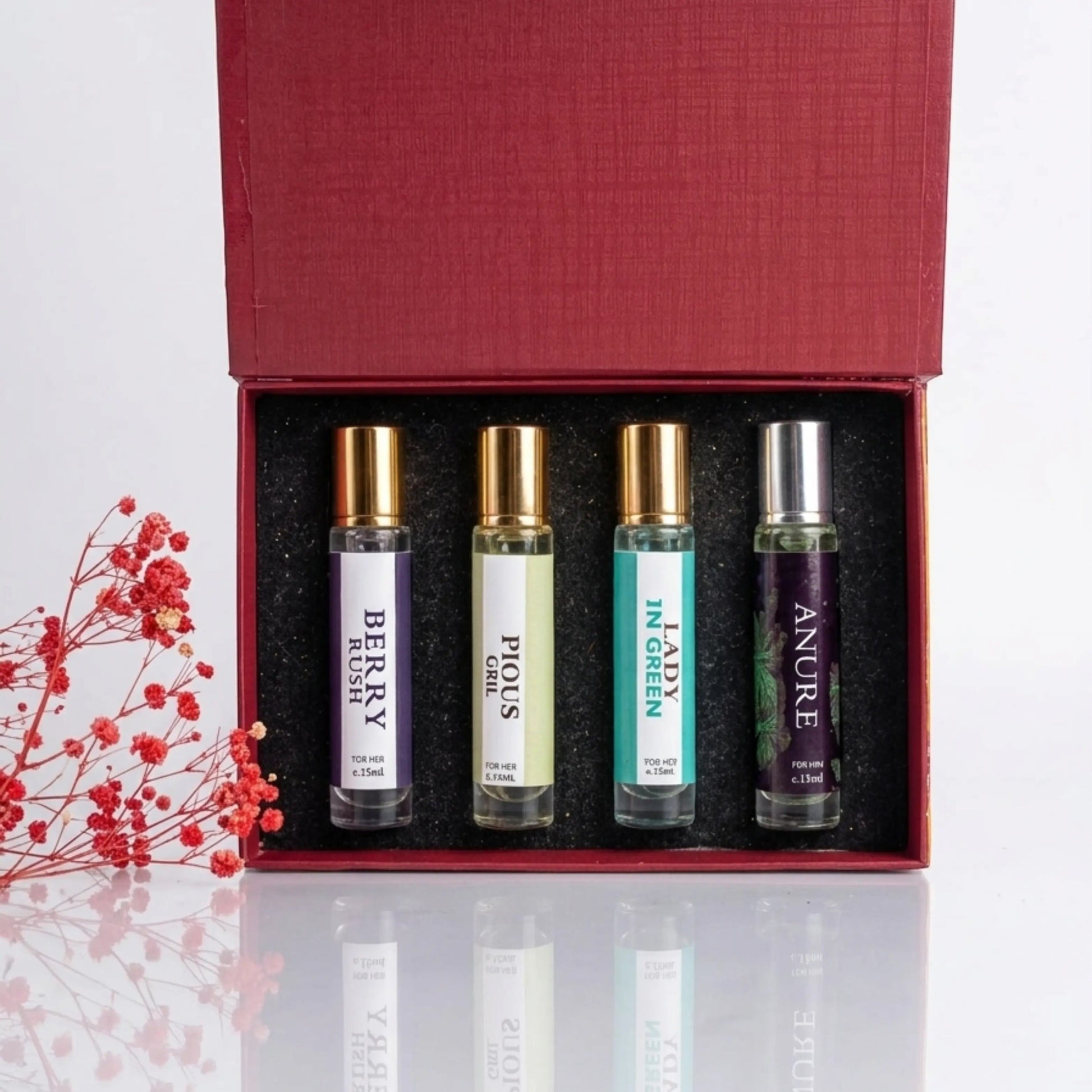 fragume 4 pocket perfume set featuring four travel-sized roll-on fragrance bottles in a red gift box