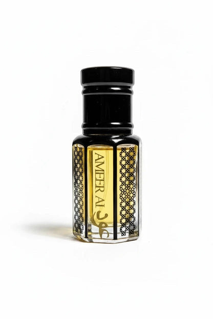 fragume Ameer Al Oud concentrated perfume oil in a decorative glass bottle with black geometric patterns