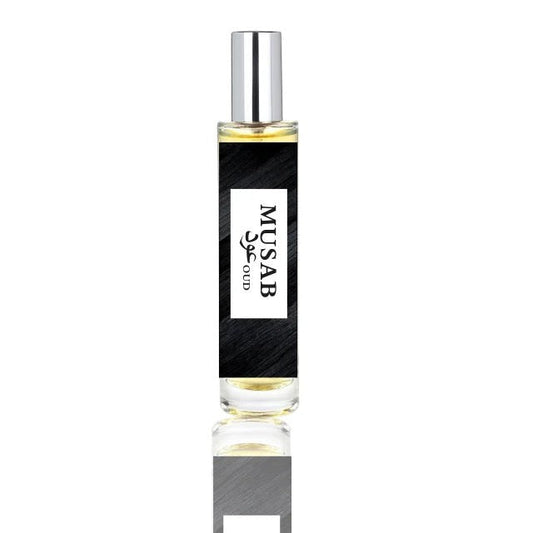 fragume Musab Oud fragrance spray in a sleek glass bottle with a black label and silver cap.