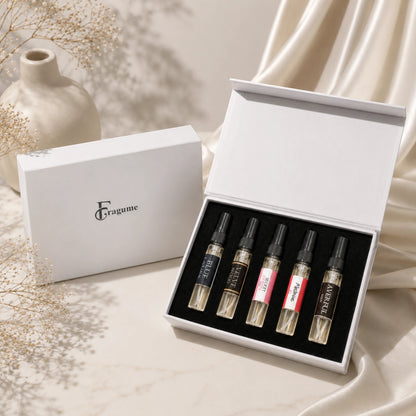 fragume Signature Fragrance Discovery Collection set featuring five perfume vials in a white minimalist gift box.